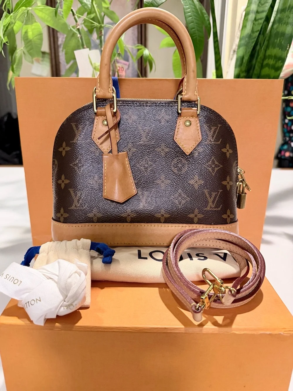 Louis Vuitton Monogram Alma BB Satchel in Brown and Natural Vachetta authentic